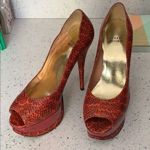 Snakeskin Stuart Weitzman platform heels.